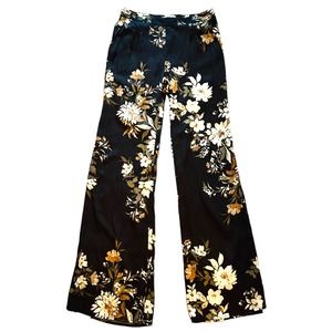 Saltwater Luxe High Waist Flair Leg Pants. Black with Floral Print.  Size S